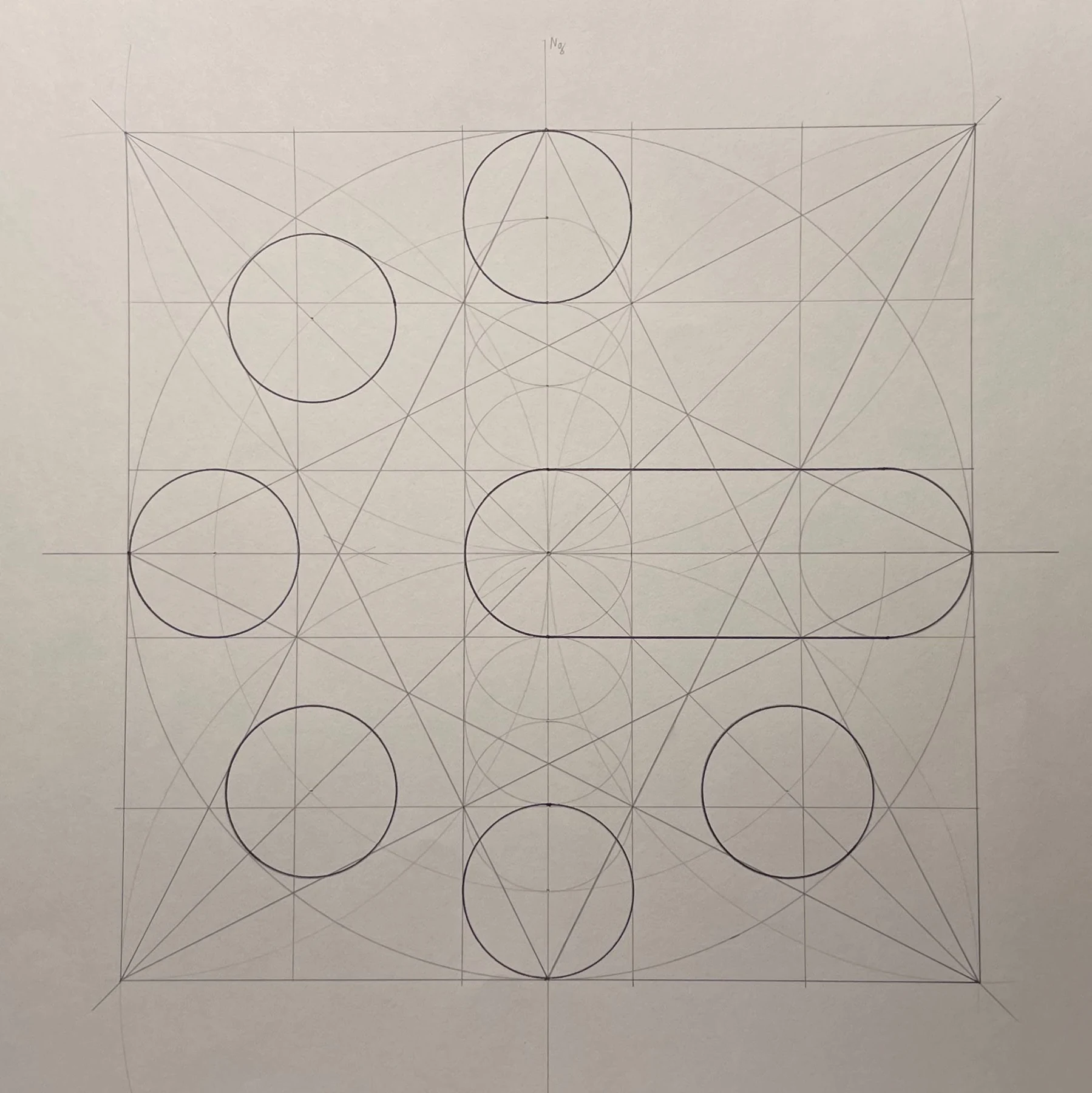 Hand-drawn construction of the GeoMusica logo, with pencil circles, arcs and guide lines on paper